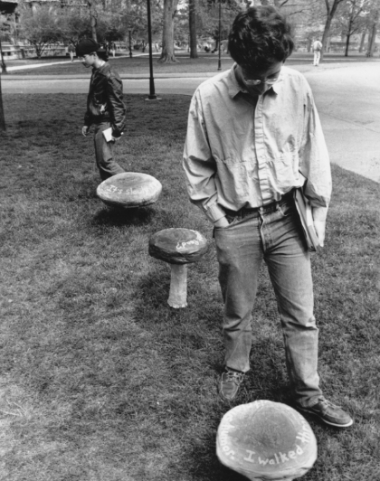 Two students looking at art installation